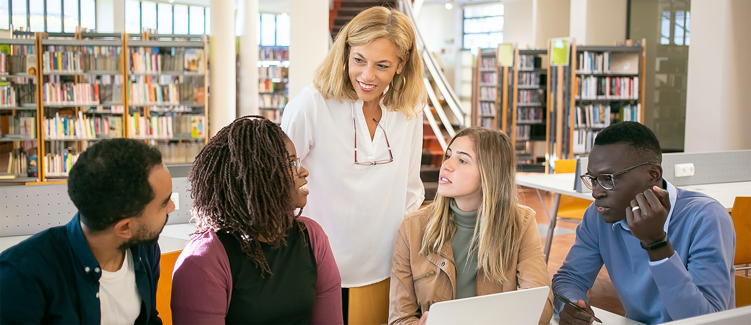 Faculty speaking with students